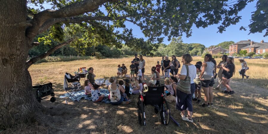 Group of children and adults at the forest school session.